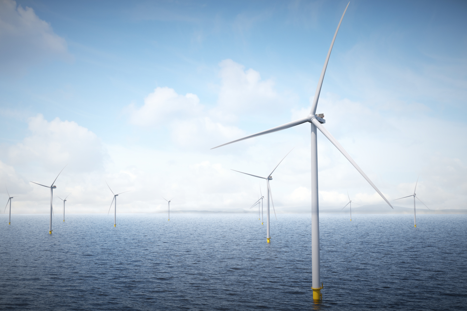 A serene offshore wind farm with multiple wind turbines spinning over calm waters under a blue sky with fluffy clouds.